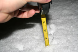 Measuring 6 inches of snow in North Tacoma